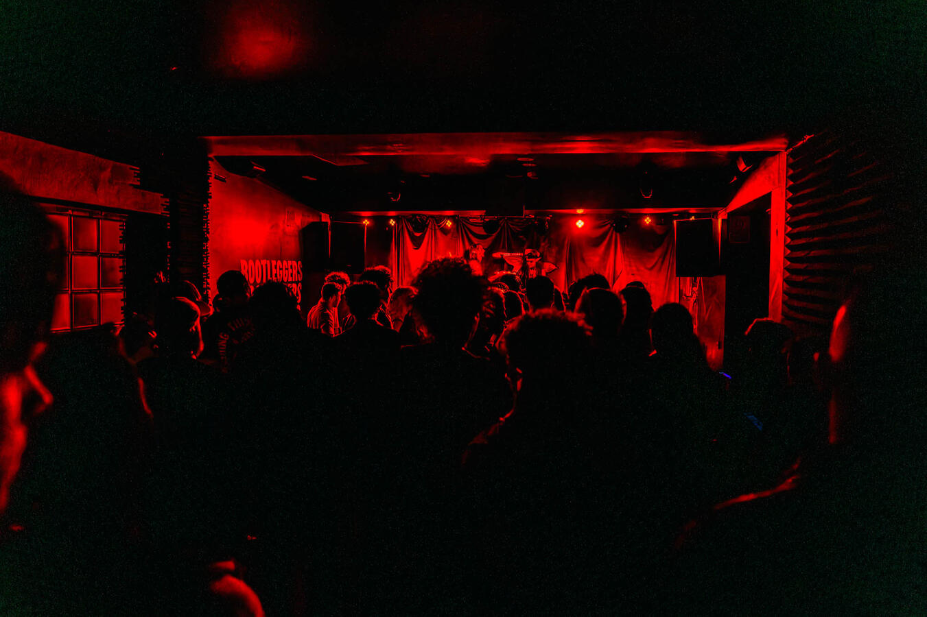 Sydney metal club crowd under dark lighting